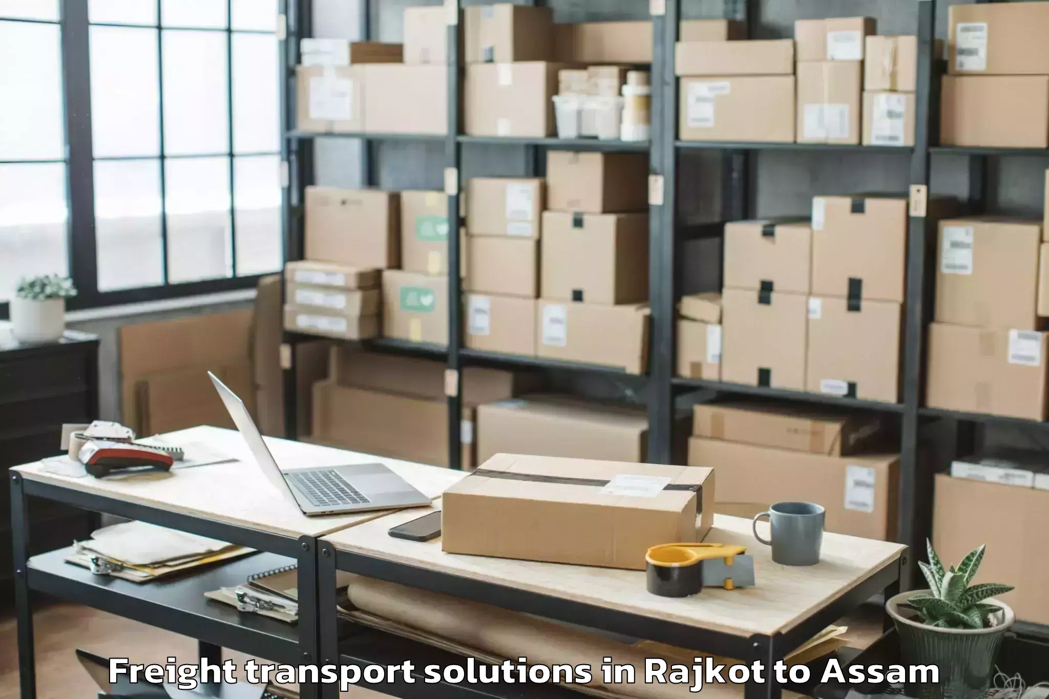 Easy Rajkot to Balijan Freight Transport Solutions Booking